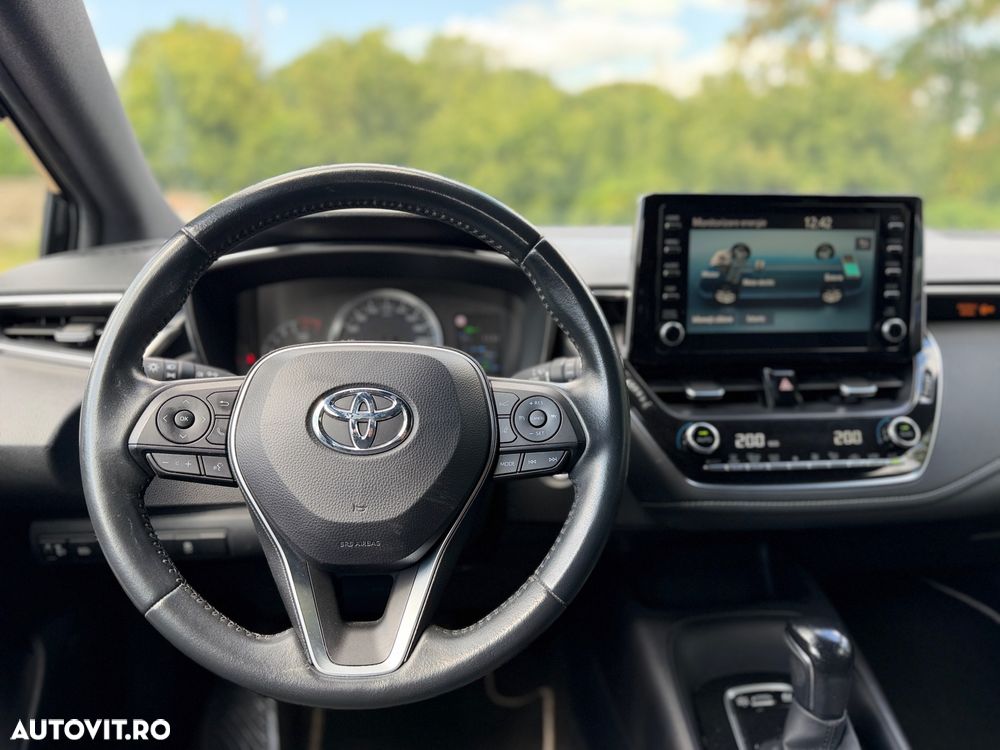 Toyota Corolla 1.8 HSD Business - 8