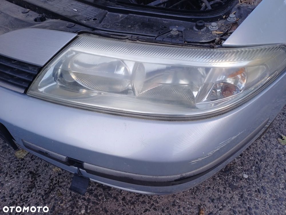 Reflektor lewy Renault Laguna 2 przed liftingiem