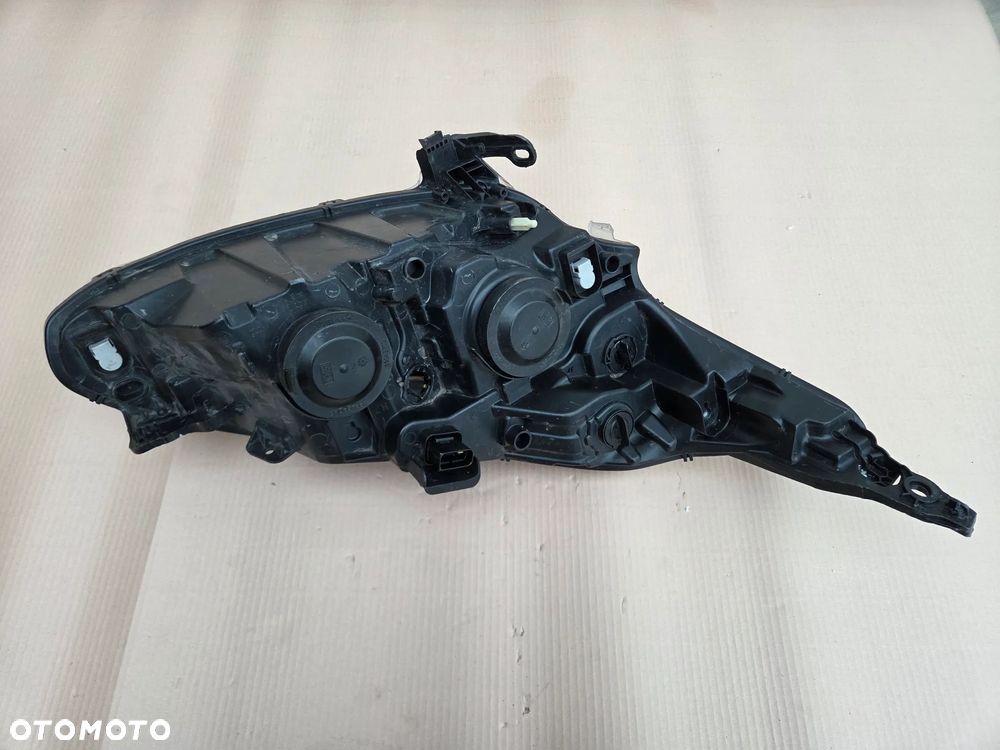 Lampa przednia lewa Peugeot 208 przed LIFT  9802221880 - 11