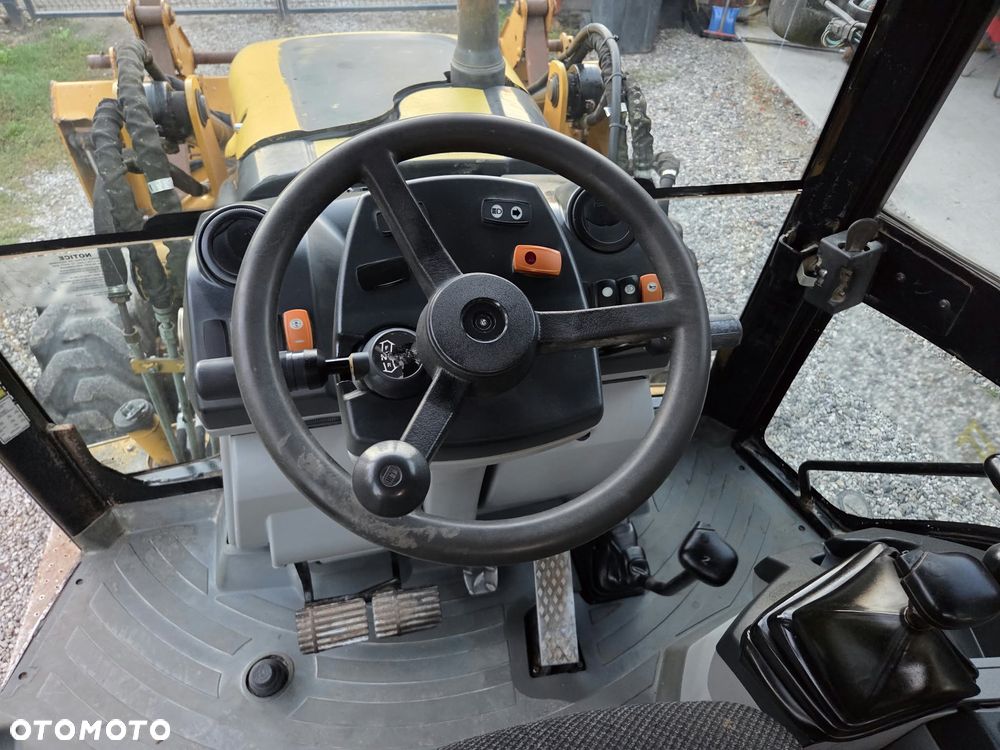 Caterpillar CAT 428E - 23