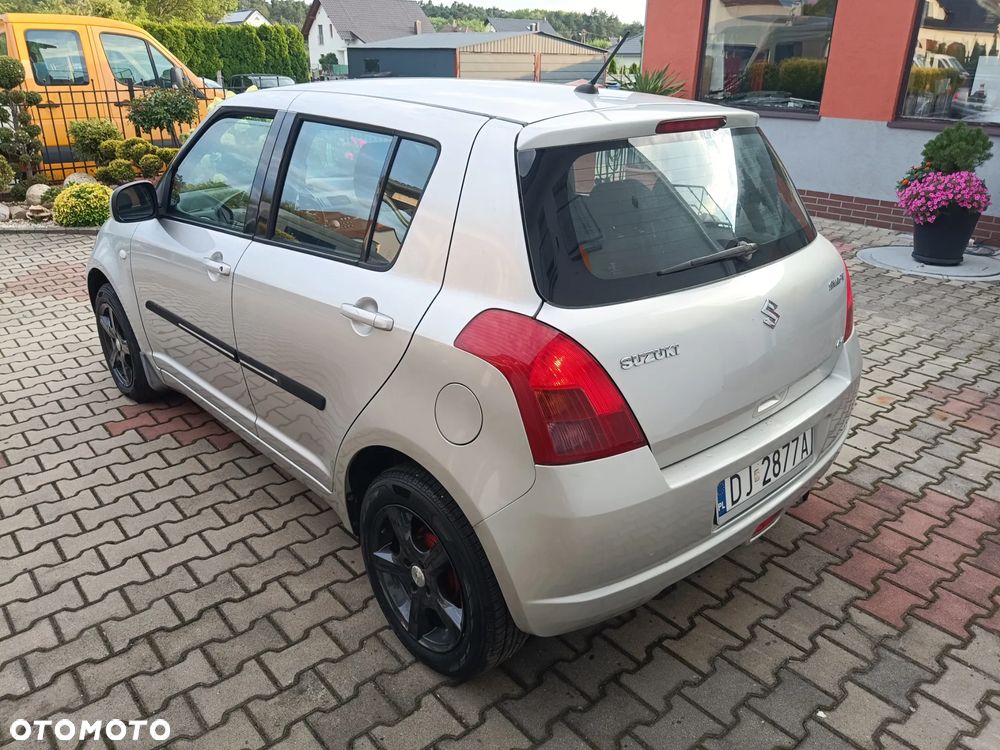 Suzuki Swift 1.3 GS / Premium 4WD - 3