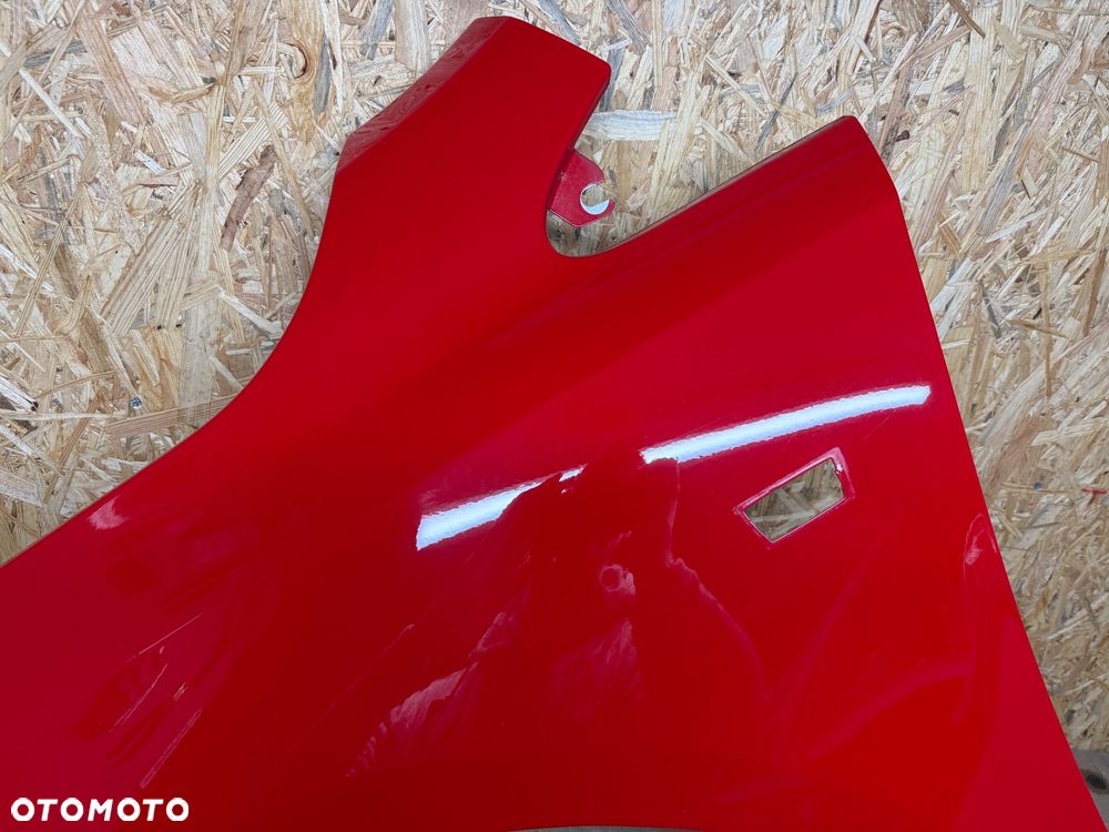 BŁOTNIK LEWY PRZÓD LEWY PRZEDNI OPEL CORSA E CZERWONY 50B - 13