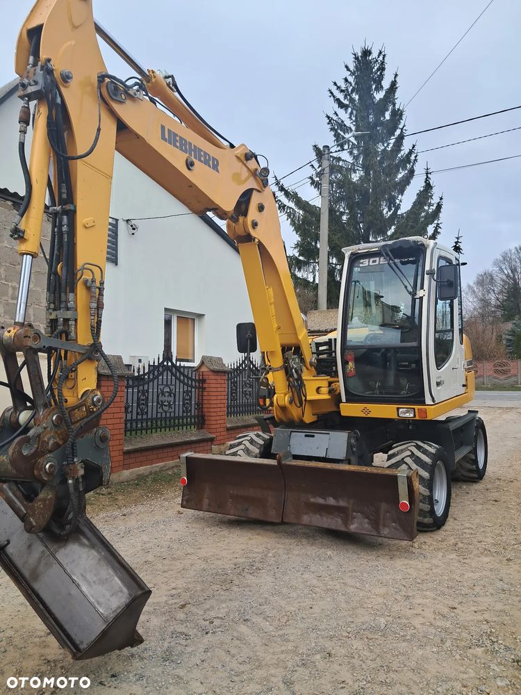 Liebherr 309 Litronic - 3