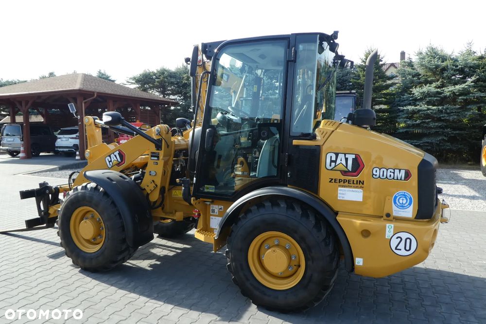Caterpillar 906M Z NIEMIEC CENTRANE SMAROWANIE