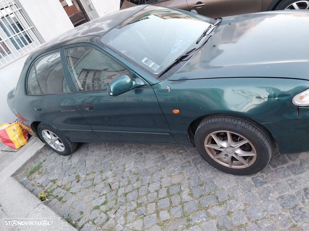 Hyundai Accent 1.3 GLS - 7