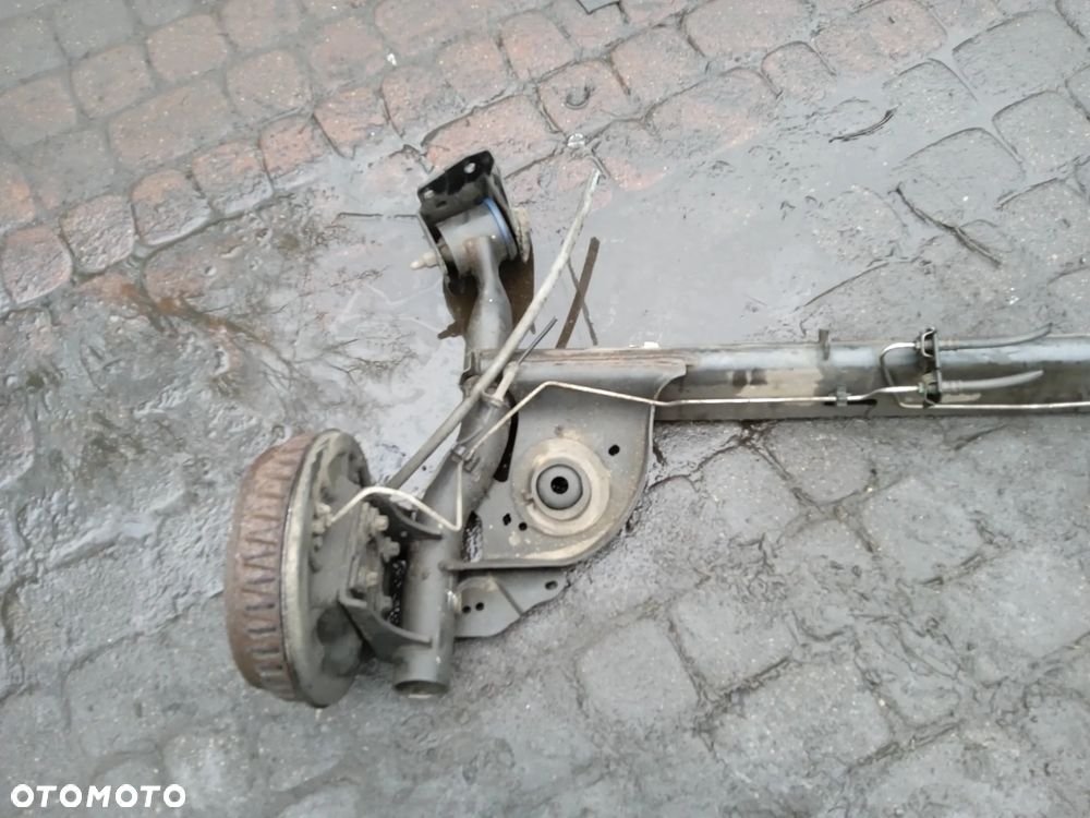 BELKA TYLNEGO ZAWIESZENIA DACIA LOGAN MCV 12-21 1.5 DCI - 2