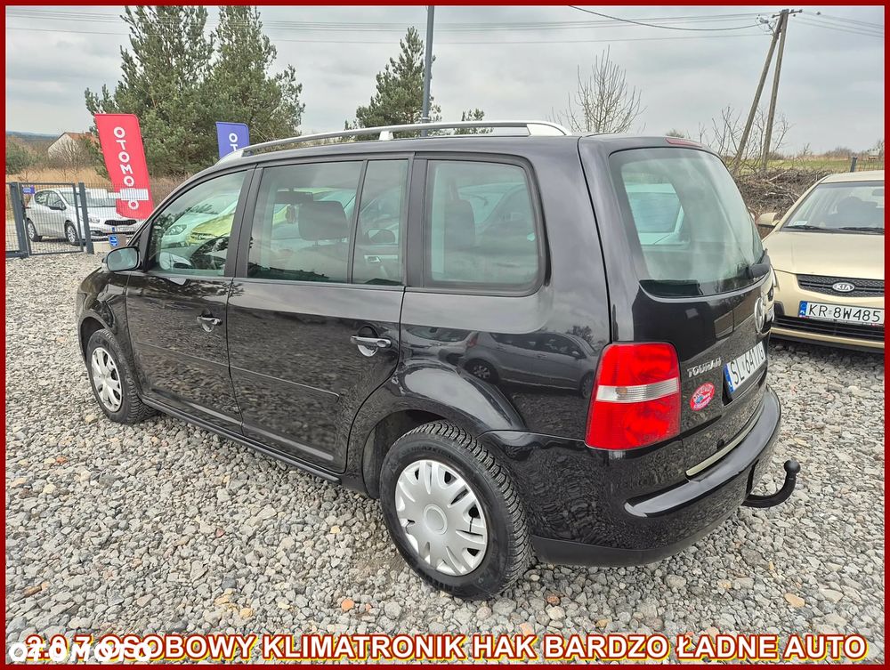 Volkswagen Touran 2.0 FSI Highline - 1