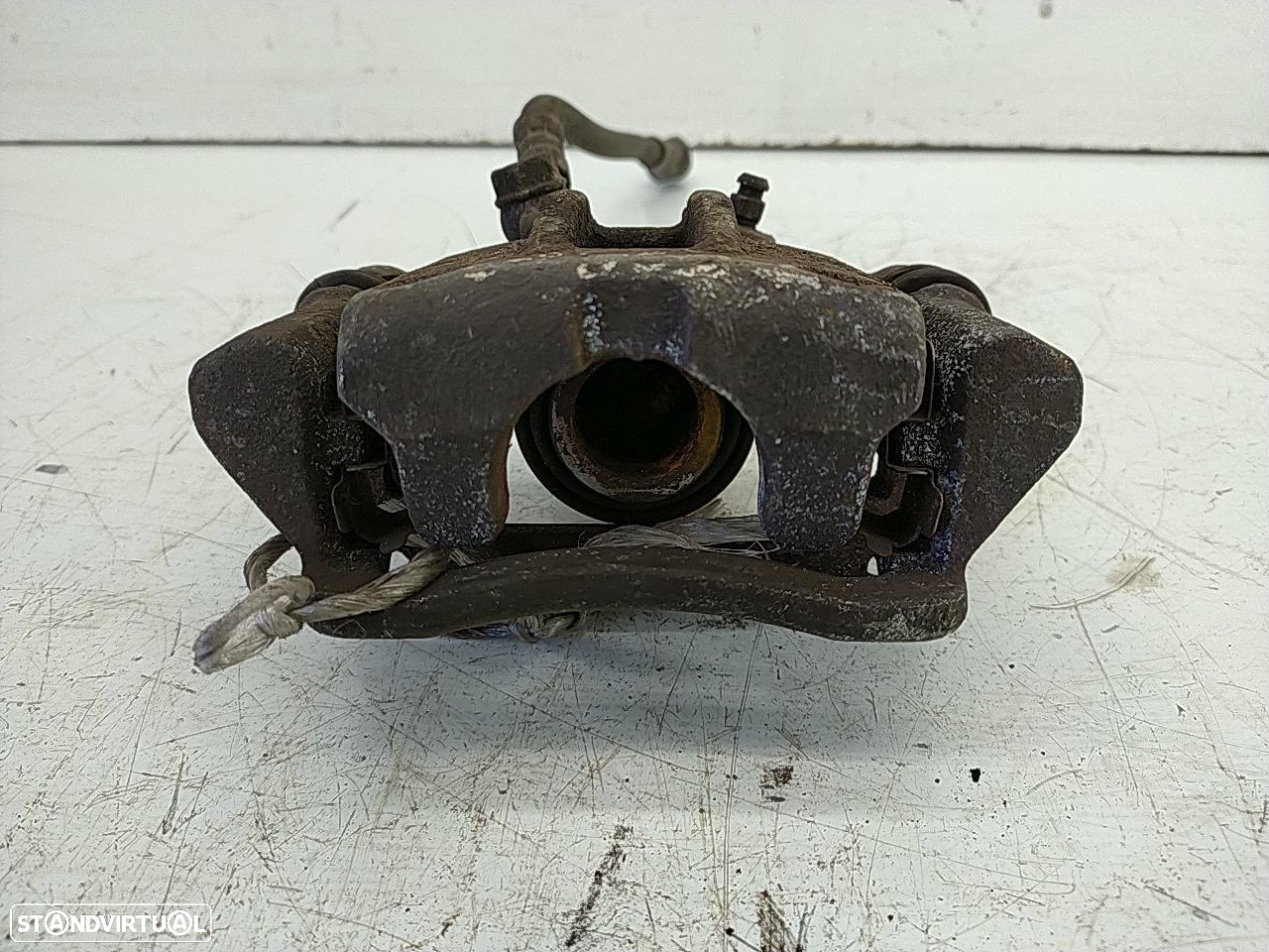 Pinça Tras Esquerda Toyota Corolla (_E12_) - 2