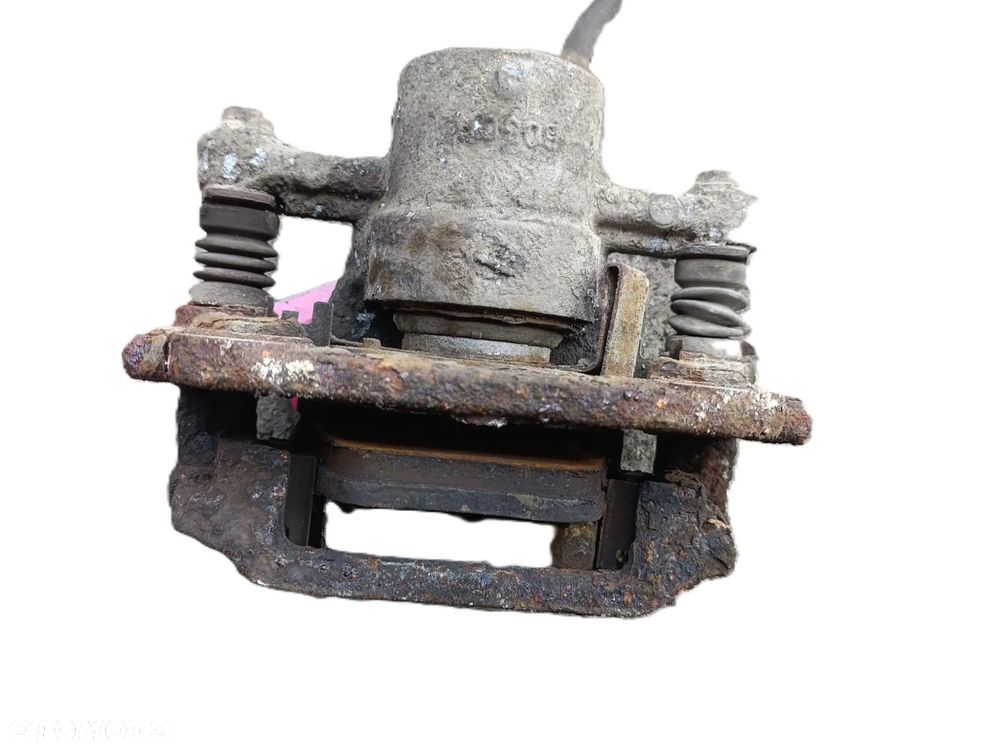 TOYOTA AVENSIS T25 03-09 r. ZACISK HAMULCOWY z JARZMEM LEWY TYŁ + - 3