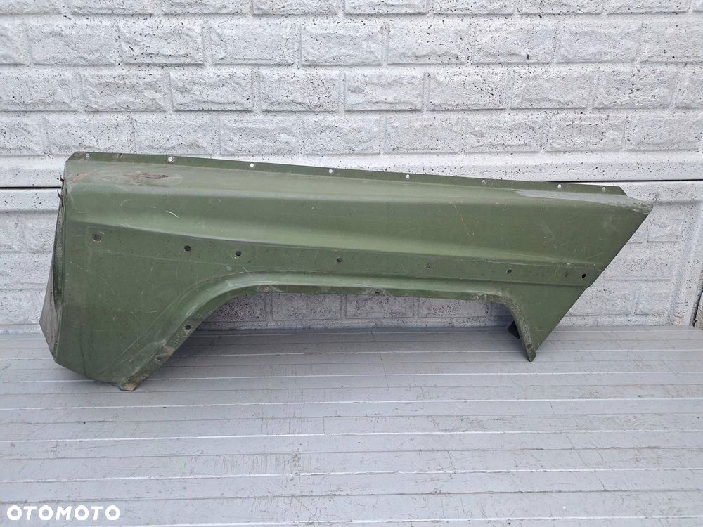 BŁOTNIK LEWY PRZÓD MERCEDES G KLASA W460 79-