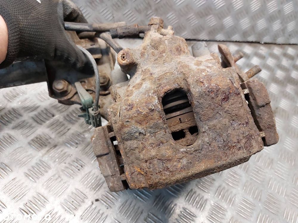 AMORTYZATOR ZWROTNICA PRAWY PRZÓD AVENSIS T22 1.6 - 3