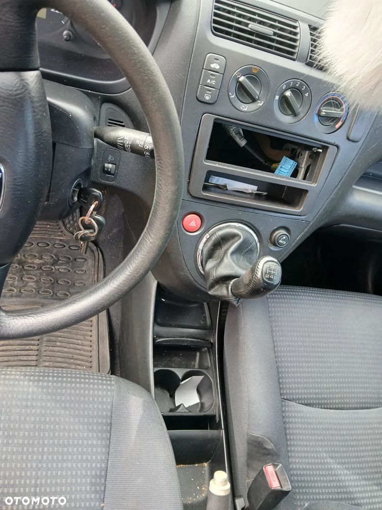honda civic VII fotel fotele kanapa deska kokpit podsufitka boczek boczki klamka podłokietnik licznik - 5