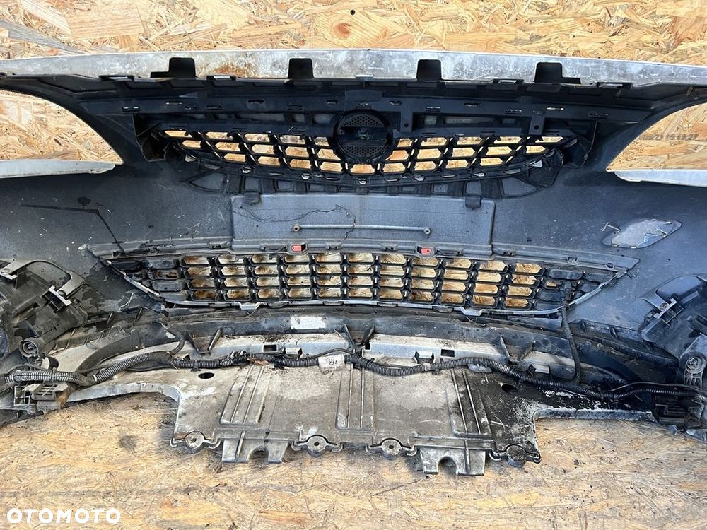 ZDERZAK PRZÓD przedni OPEL ASTRA J Kod lakieru: GAZ halogeny - 10