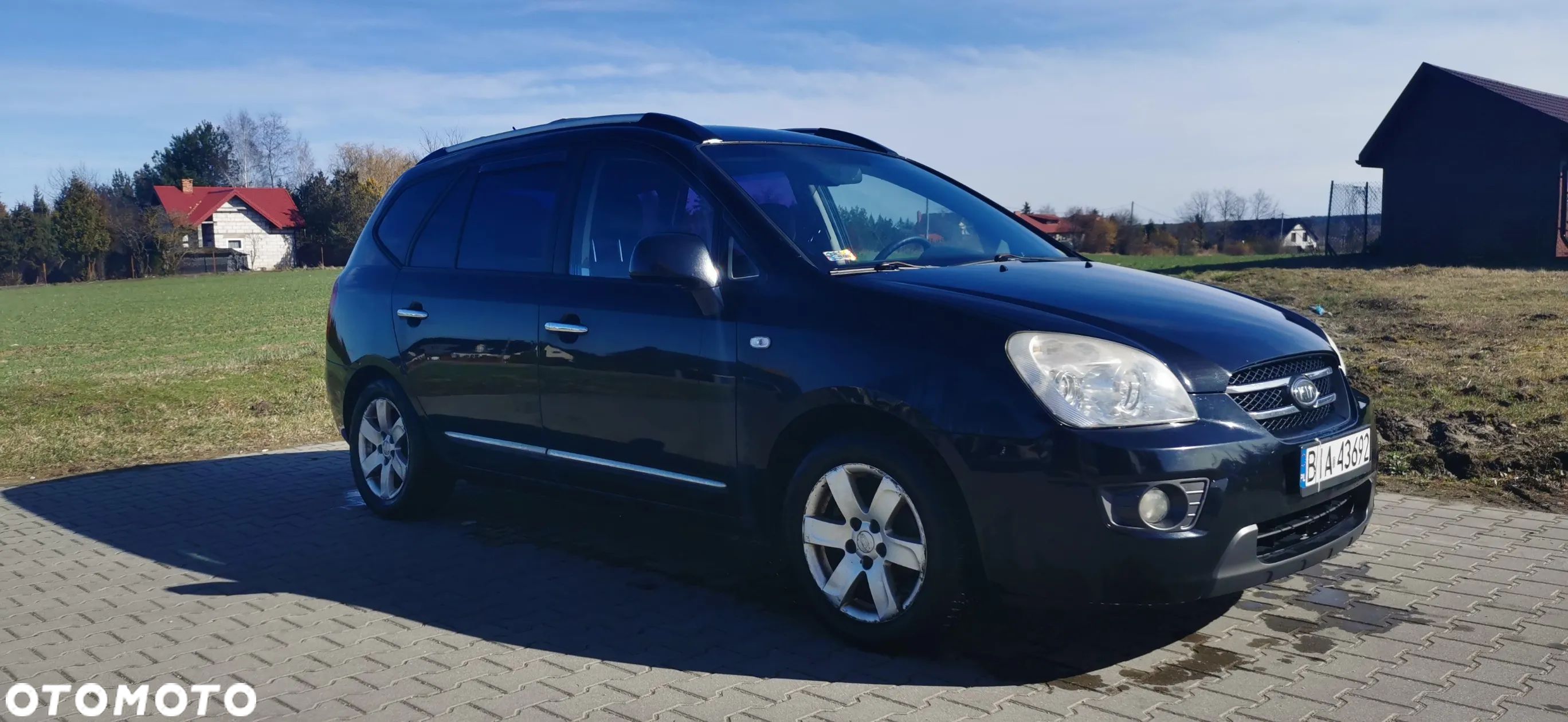 Kia Carens 2.0 CVVT EX - 1