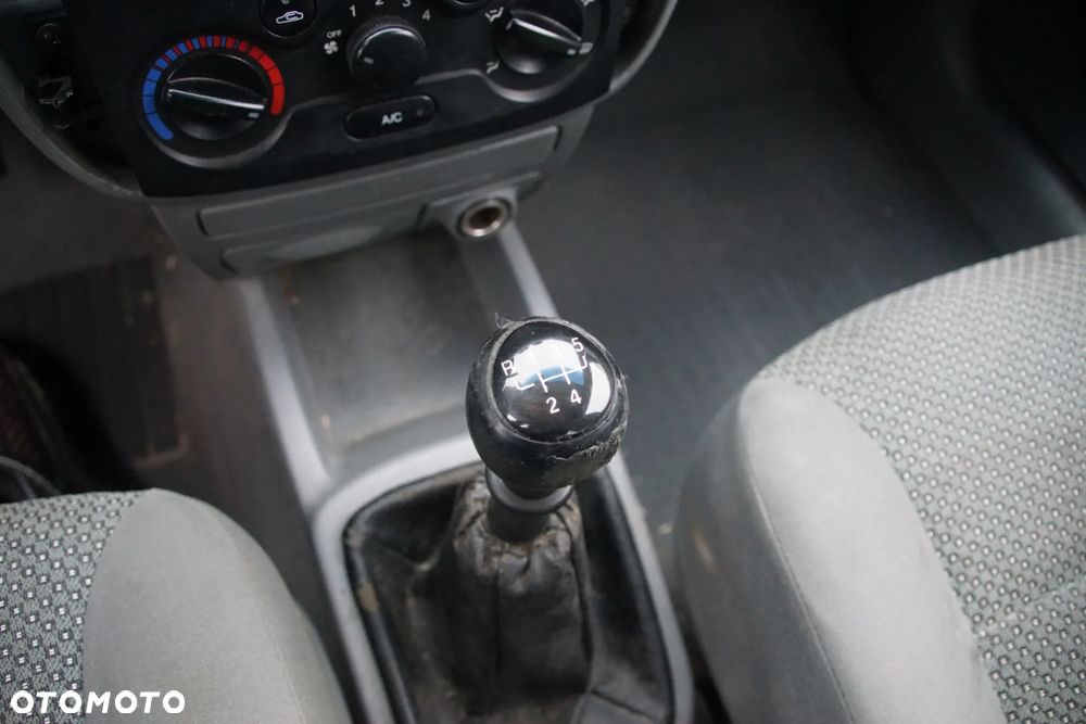 Auto na części - Daewoo Kalos 1.4 E-TEC II 94 KM F14D3 2005R Silnik Skrzynia Drzwi Maska Klapa Błotnik Zderzak Lampa Lusterko Klamka Deska Kokpit Sterownik Moduł Licznik Kierownica Panel - 11