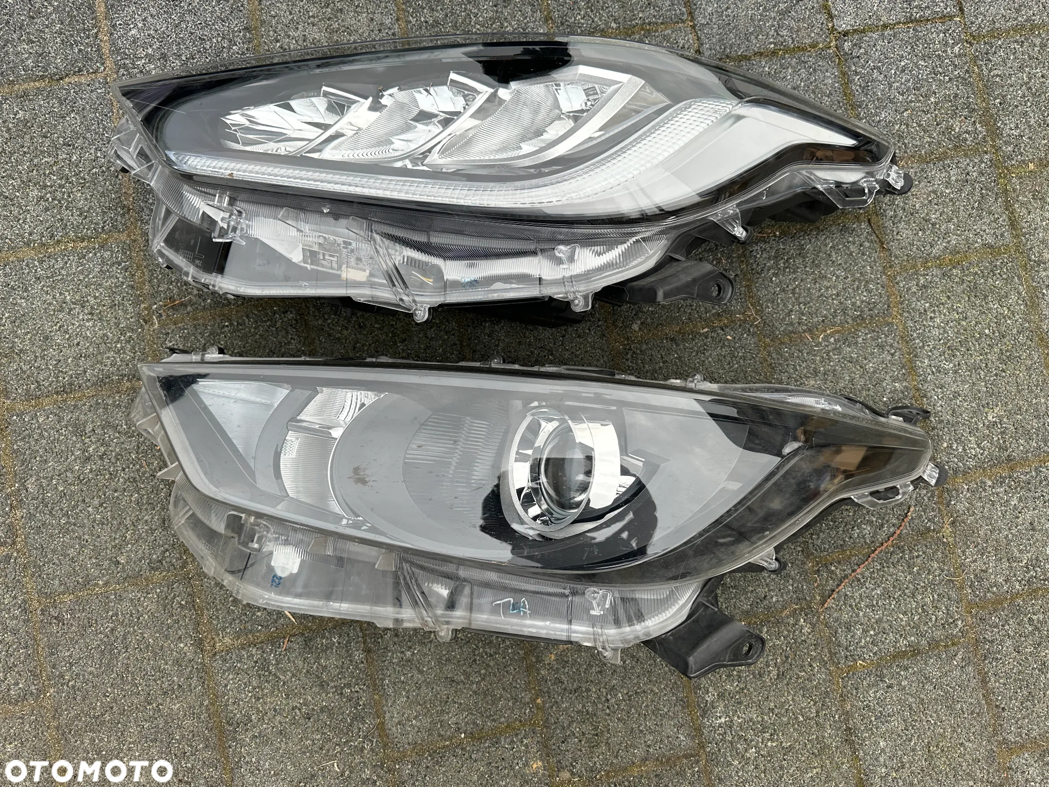 zderzak Yaris IV lift przod maska lampy - 6