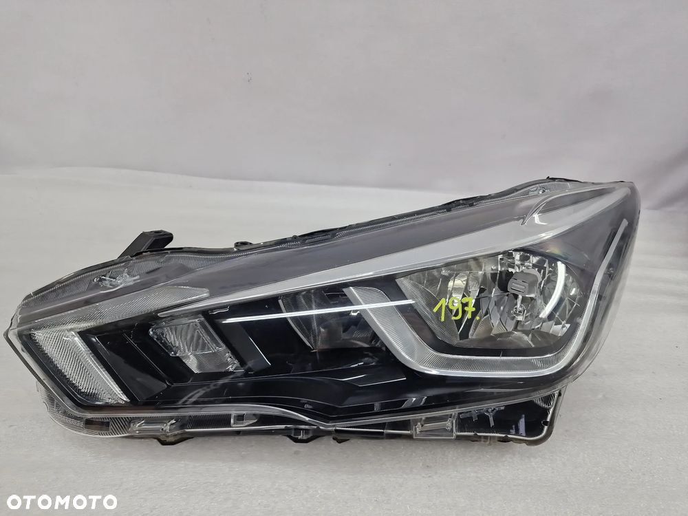 NISSAN MICRA K16 16- LEWA ZWYKŁA LAMPA PRZEDNIA PRZÓD LED , NR KOITO 100-18730 / 100-18728 , NR AUKCJI LA197 - 1