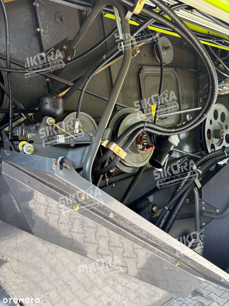Claas Tucano 320 z hederem - 6