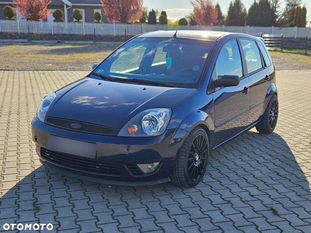 Ford Fiesta 1.4 Ghia - 14