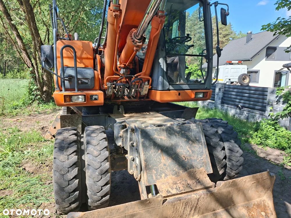 Doosan DX210W - 3
