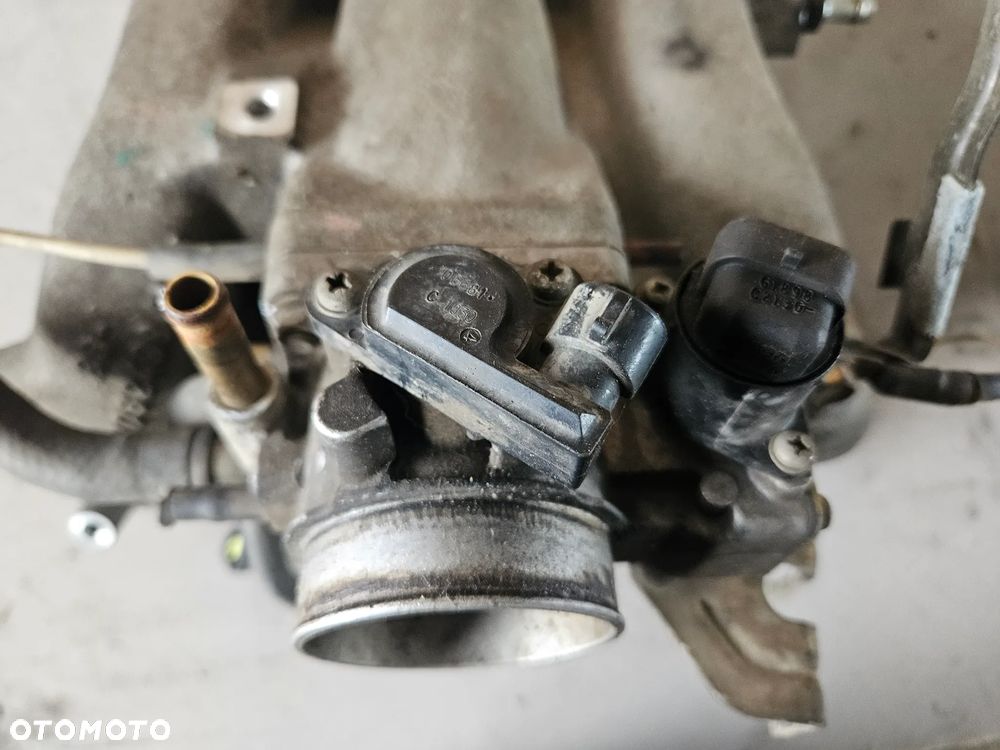 Przepustnica Daewoo Rezzo Tacuma 2,0 b 2001r 9430060028 9430060038 - 2