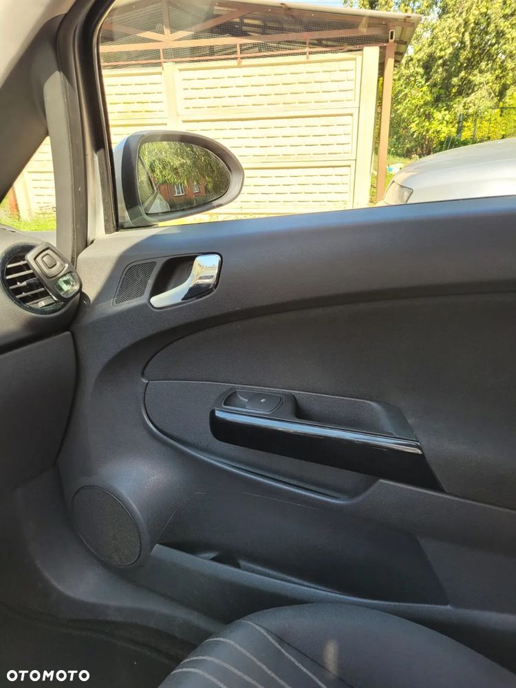 Opel Corsa 1.4 16V Enjoy - 13