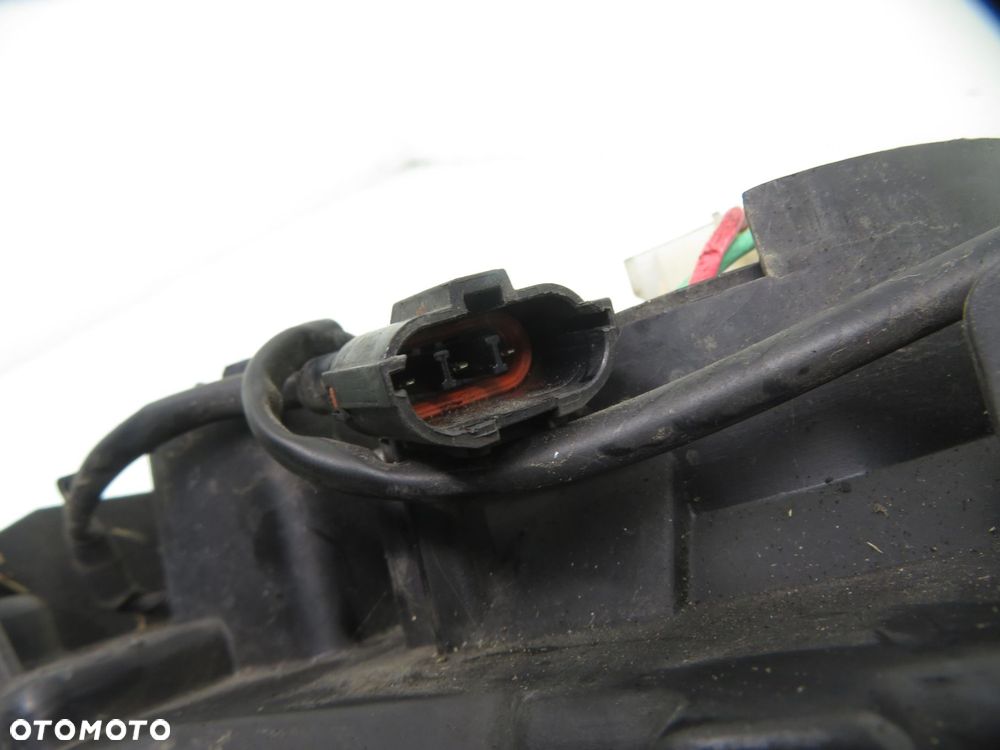 LAMPA LEWA PRZEDNIA KIA CARENS II - 3