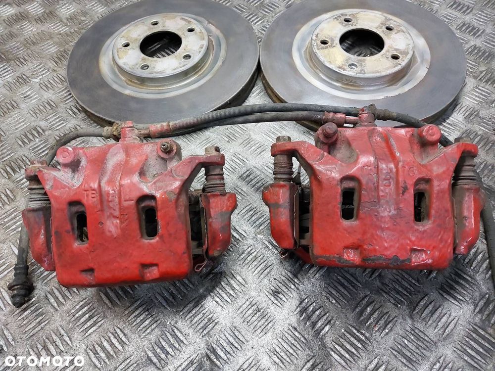 TARCZE HAMULCOWE PRZÓD + KLOCKI + ZACISKI NISSAN QASHQAI I J10 2.0 DCI - 2