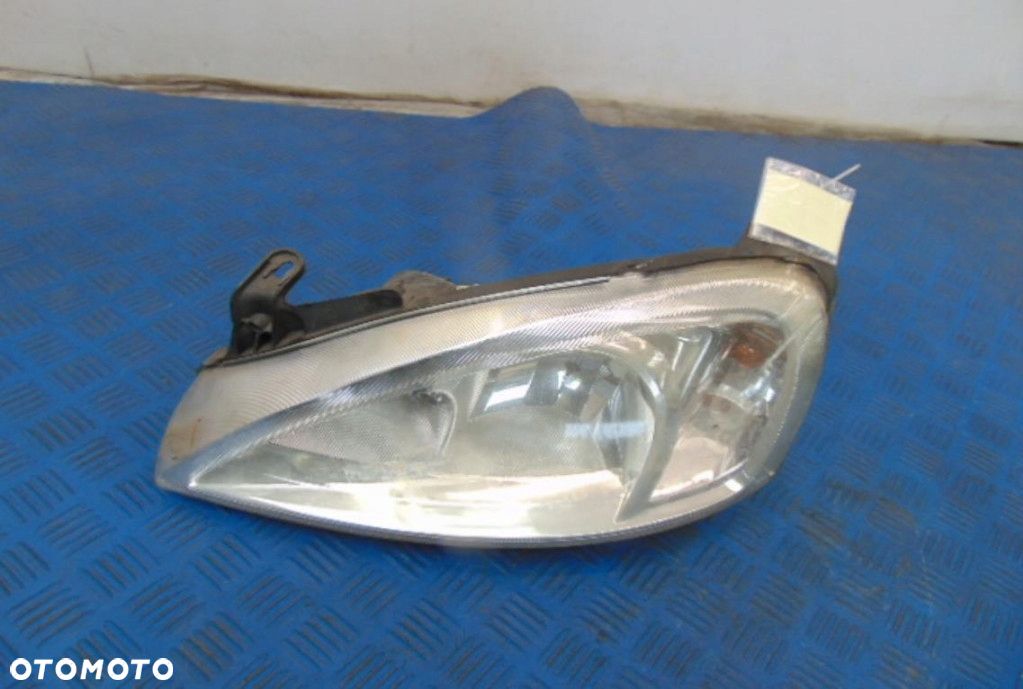 OPEL CORSA C HB REFLEKTOR LEWY STAN JAK NA ZDJĘCIU - 1