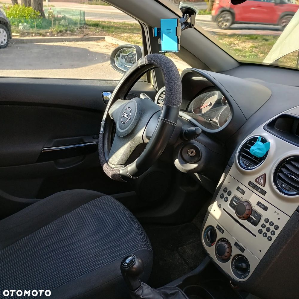 Opel Corsa 1.2 16V Enjoy - 11