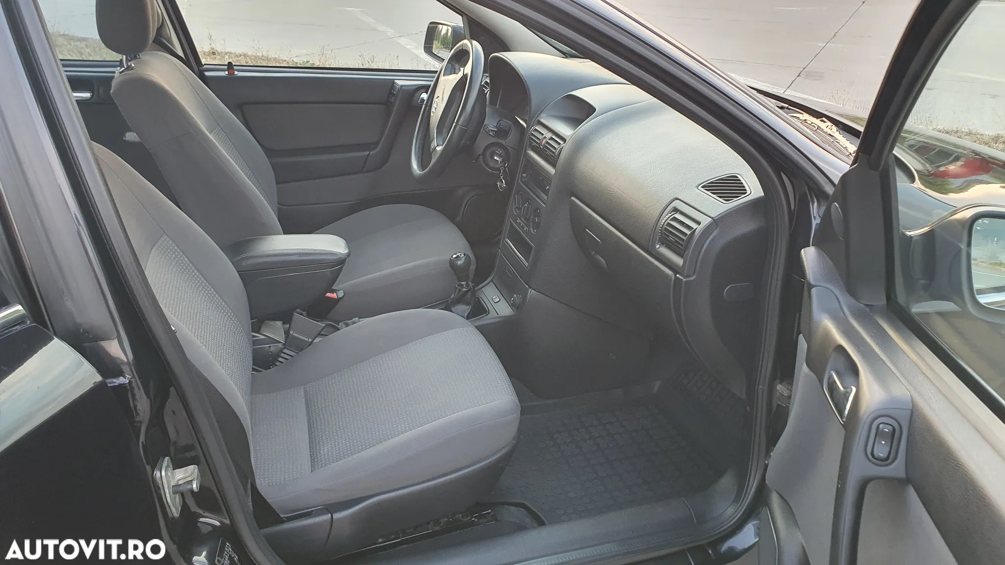 Opel Astra 1.4i 16V Club - 11