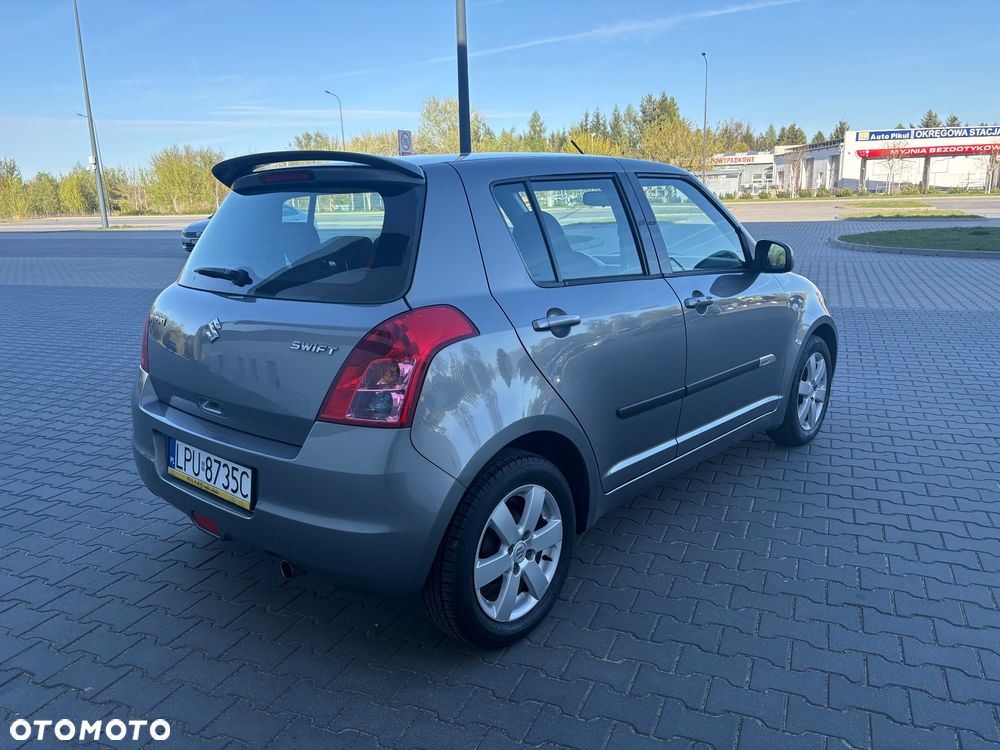 Suzuki Swift 1.3 Sakura - 5