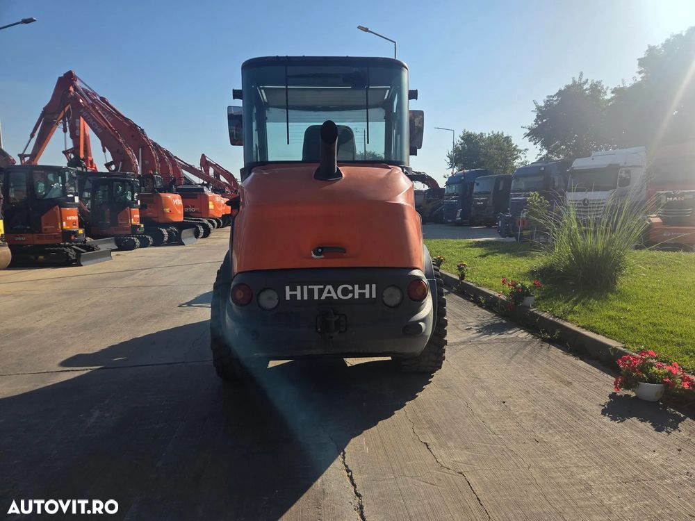 Hitachi ZW75-6, 2019, 2.745h, CUPA MULTIFUNCTIONALA 1mc, FURCI, CUPLA RAPIDA, ridica 2,4 tone la 3,2m, incarca 8x4 si  sem basculabila, Masa operationala 5tone, Anv 80% ok, motor 75CP, produs in Germania, posibilitate leasing 3 ani-PROMOTIE 29.900 EUR+Tva - 3
