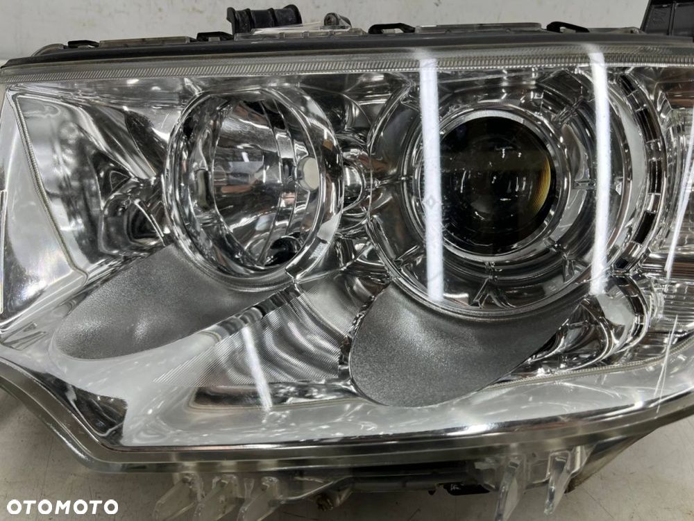 Lampa reflektor Mitsubishi L200 LIFT 10-15r. Pajero Sport II 03-16r. LEWA przednia soczewka EUROPA - 7
