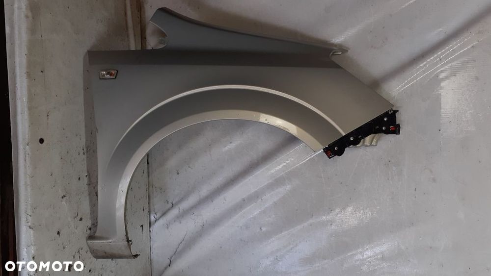 OPEL ZAFIRA B BŁOTNIK PRZEDNI PRZÓD PRAWY DO MALOWANIA - 1