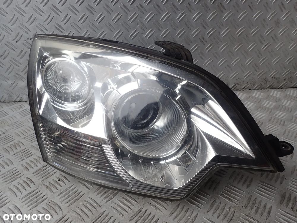 LAMPA XENON PRAWY PRZÓD OPEL ANTARA - 1