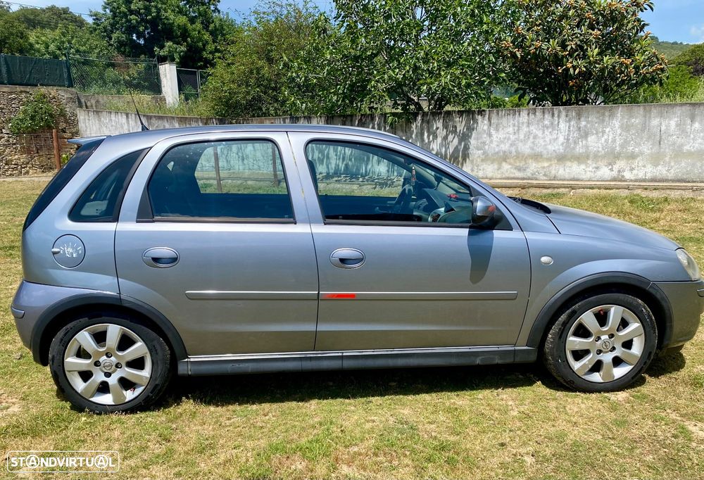 Opel Corsa 1.2 16V Cosmo - 1