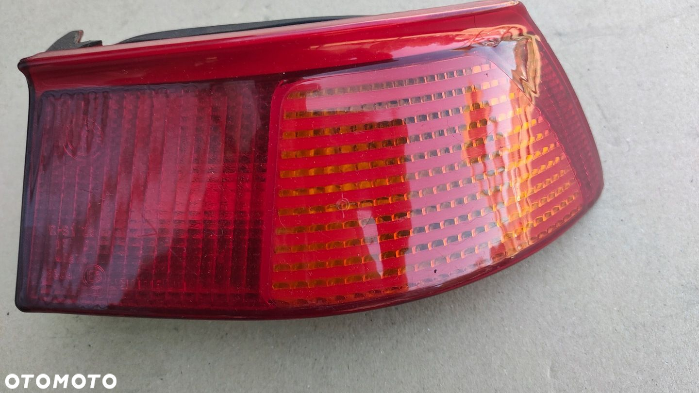 Alfa Romeo 145 lampa tylna prawa.Wkład.100. - 2