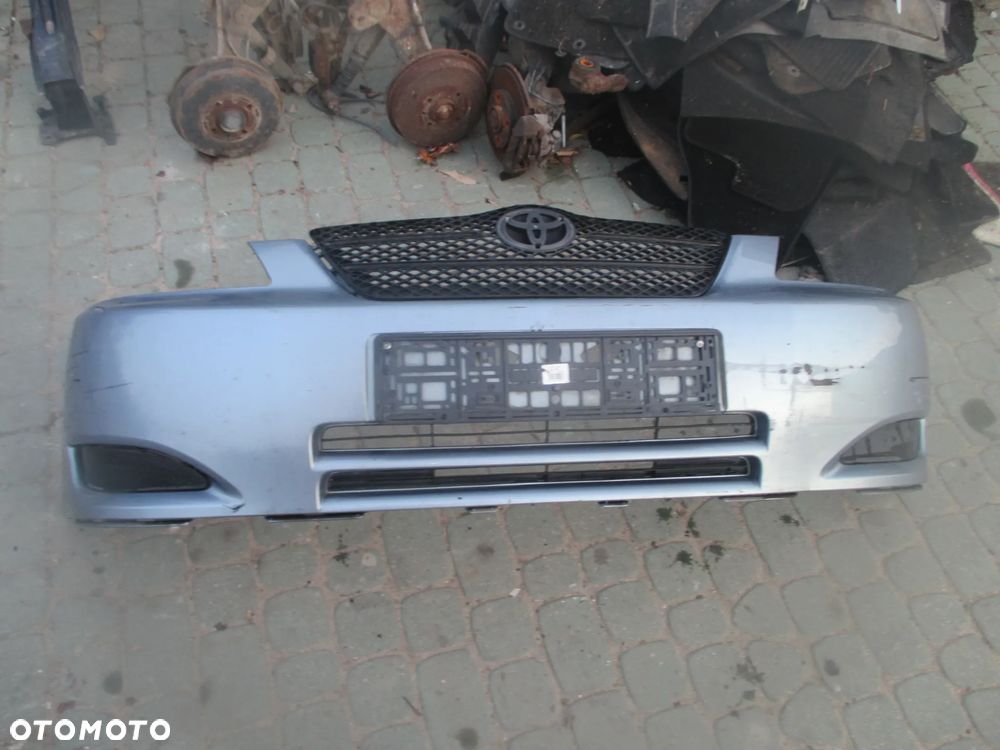 Zderzak Toyota Corolla E12 8Q3 + Grill - 2