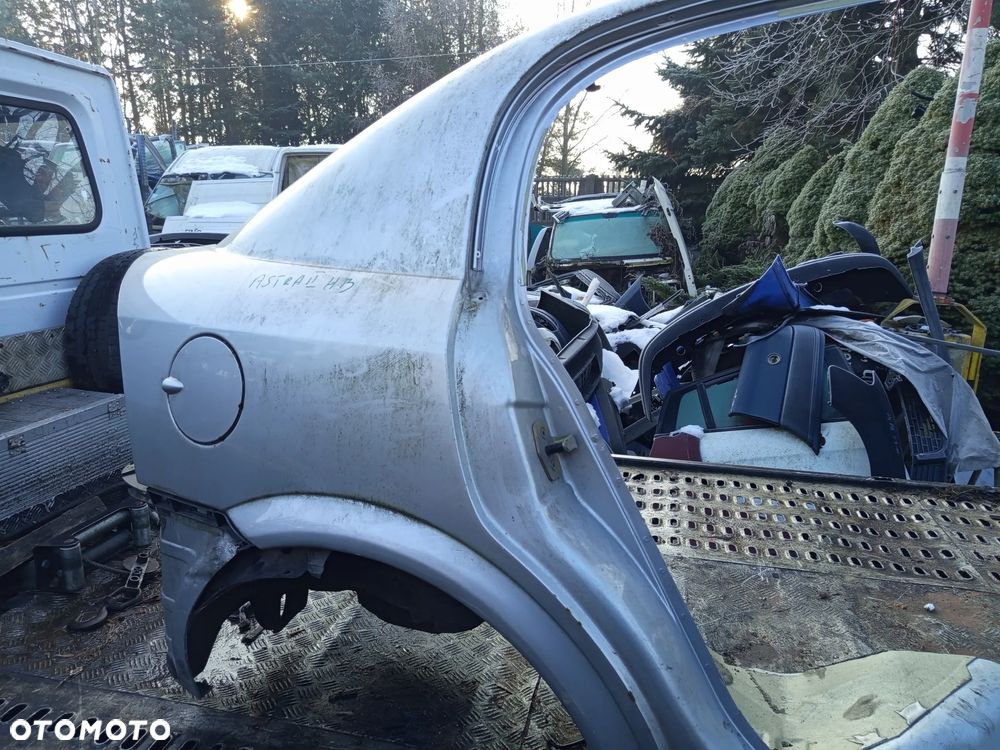 BŁOTNIK TYLNY LEWY LUB PRAWY OPEL ASTRA II G 5D - 5