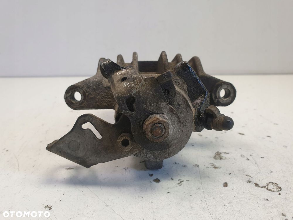 Skoda Octavia I ZACISK HAMULCOWY lewy TYŁ TYLNY - 6