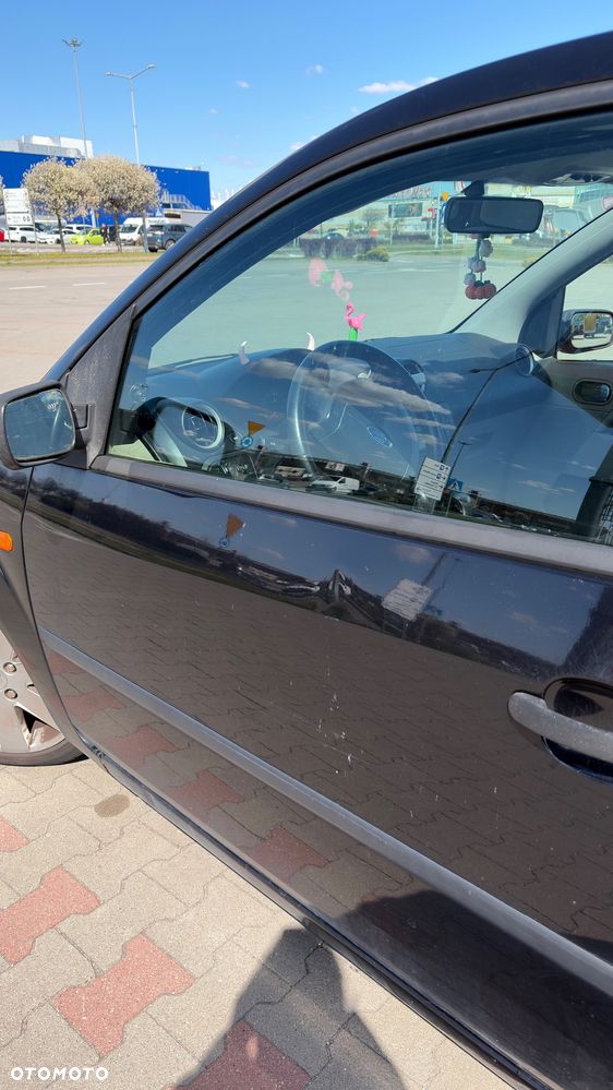 Ford Fiesta 1.4 Ghia - 10