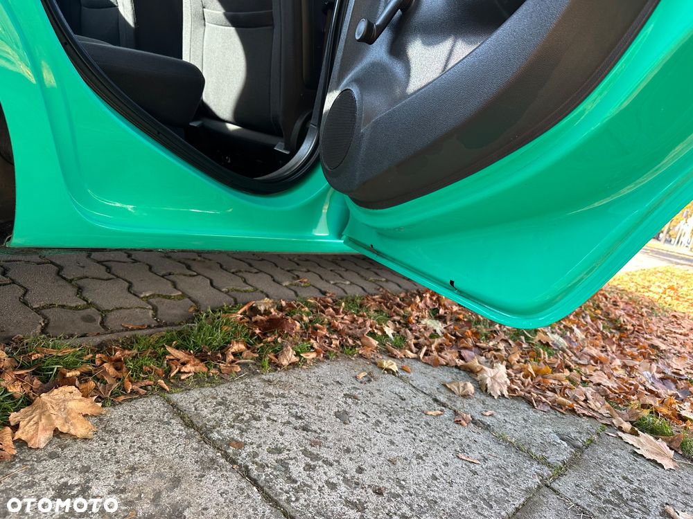 Opel Corsa 1.2 16V Enjoy - 24