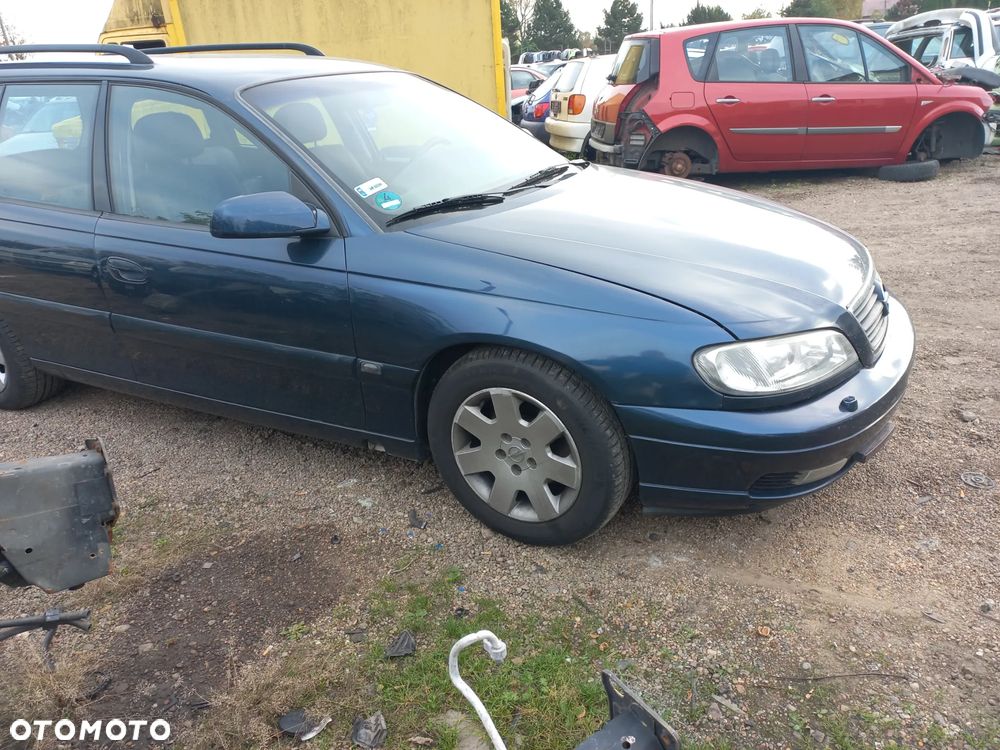 Opel Omega B lift 2.2 benzyna kombi Z20H blotnik przedni lewy prawy - 2