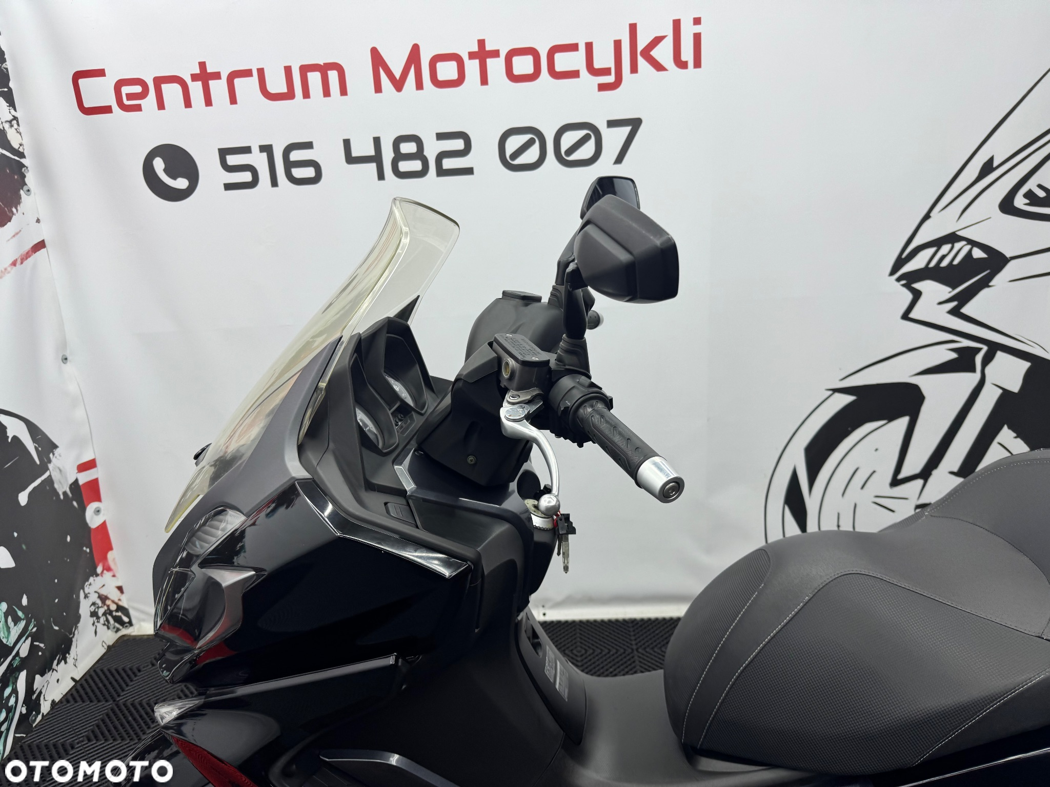 Kymco Downtown - 14