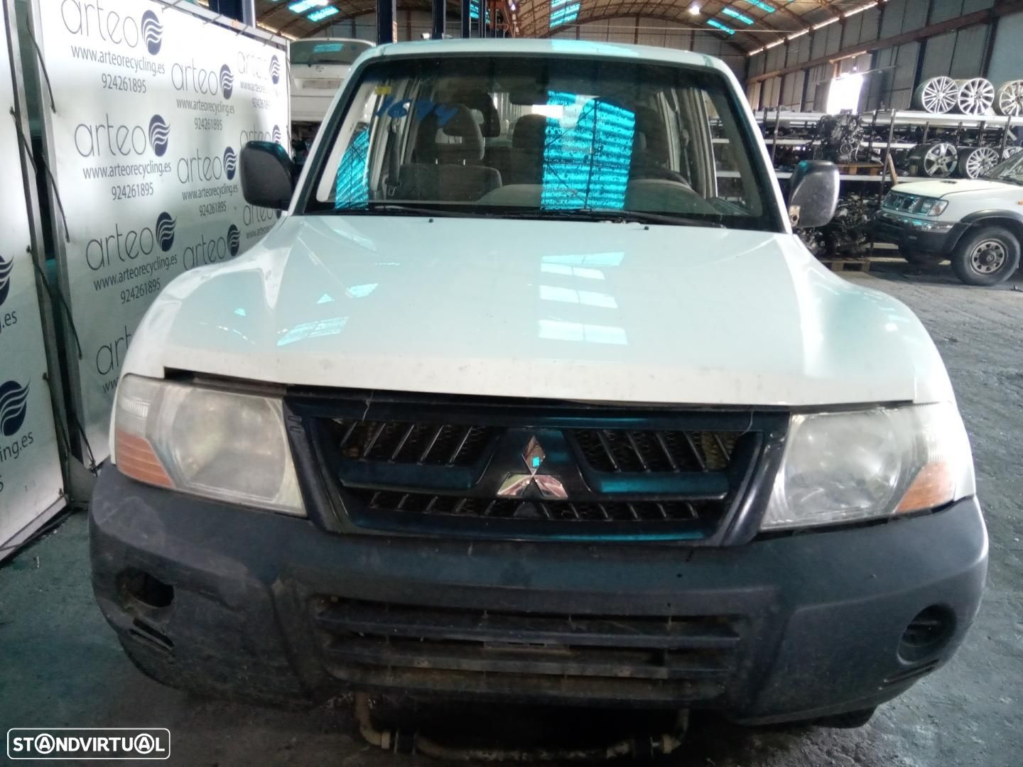 FAROL DIREITO MITSUBISHI MONTERO V60V70 - 1