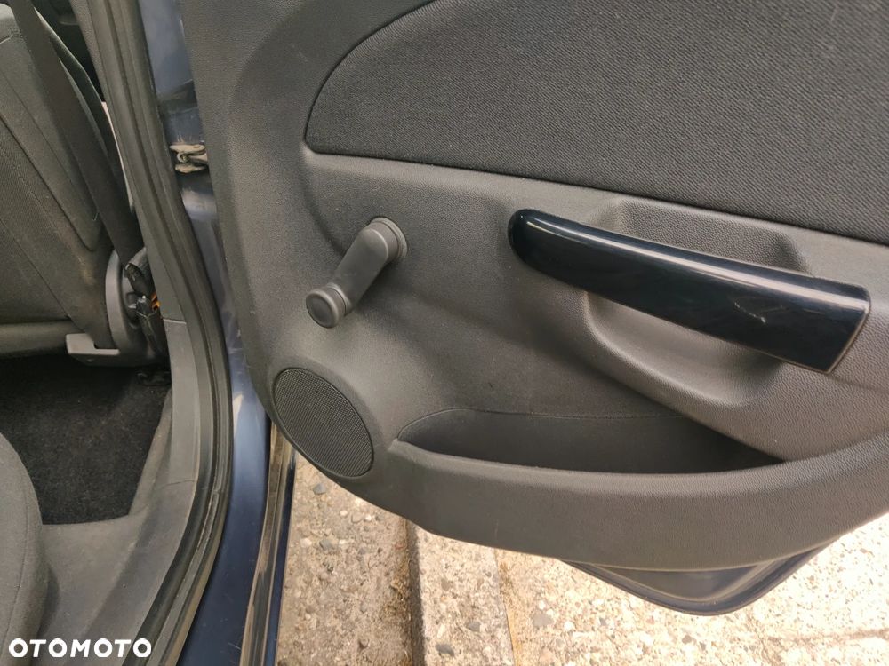 Opel Corsa 1.2 16V Enjoy - 13