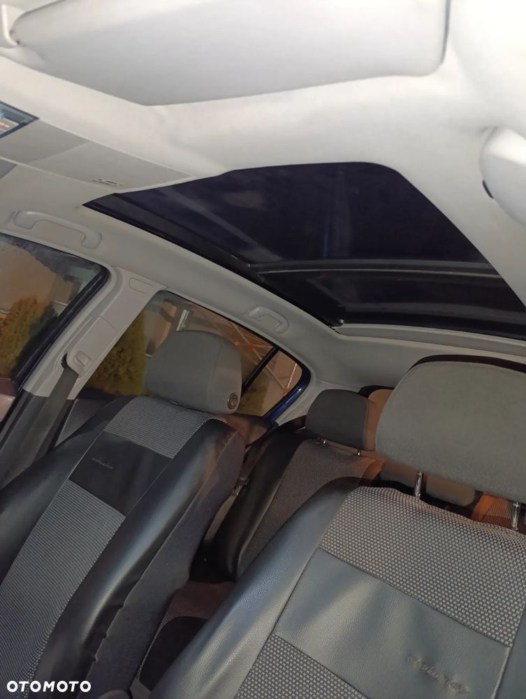 Opel Astra 1.9 CDTI Cosmo - 12