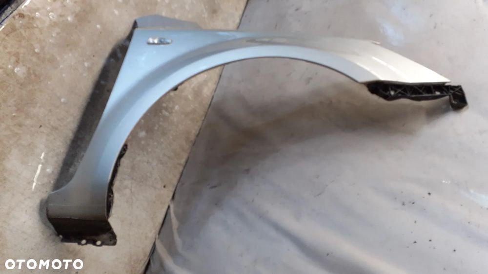 * BŁOTNIK PRAWY PRZÓD PRZEDNI KIA CEED  ORYGINAŁ SREBRNY 9S - 2