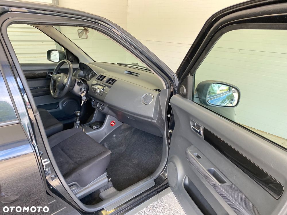 Suzuki Swift 1.3 Club - 14